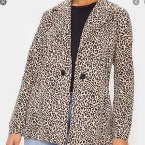 Never worn leopard blazer with black buttons